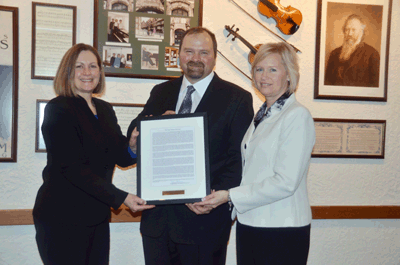Bruce and Jennifer Lewis are the 2013 MSU Dairy Farmer of the Year Award winners.