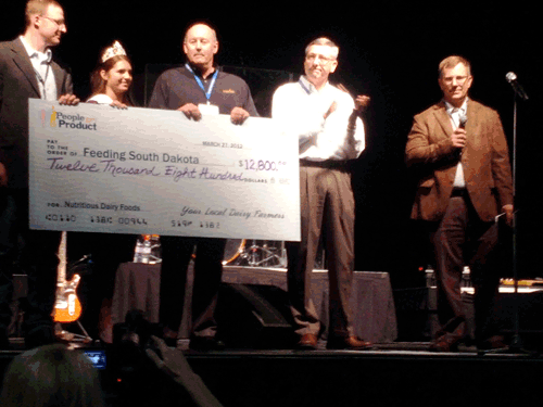 Check presentation to Feeding South Dakota from South Dakota dairy farmers