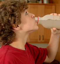 Student drinking chocolate milk
