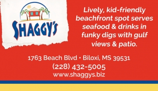 Lively, Kid-Friendly Beachfront Spot Serves Seafood & Drinks in Funky Digs with Gulf Views & Patio
